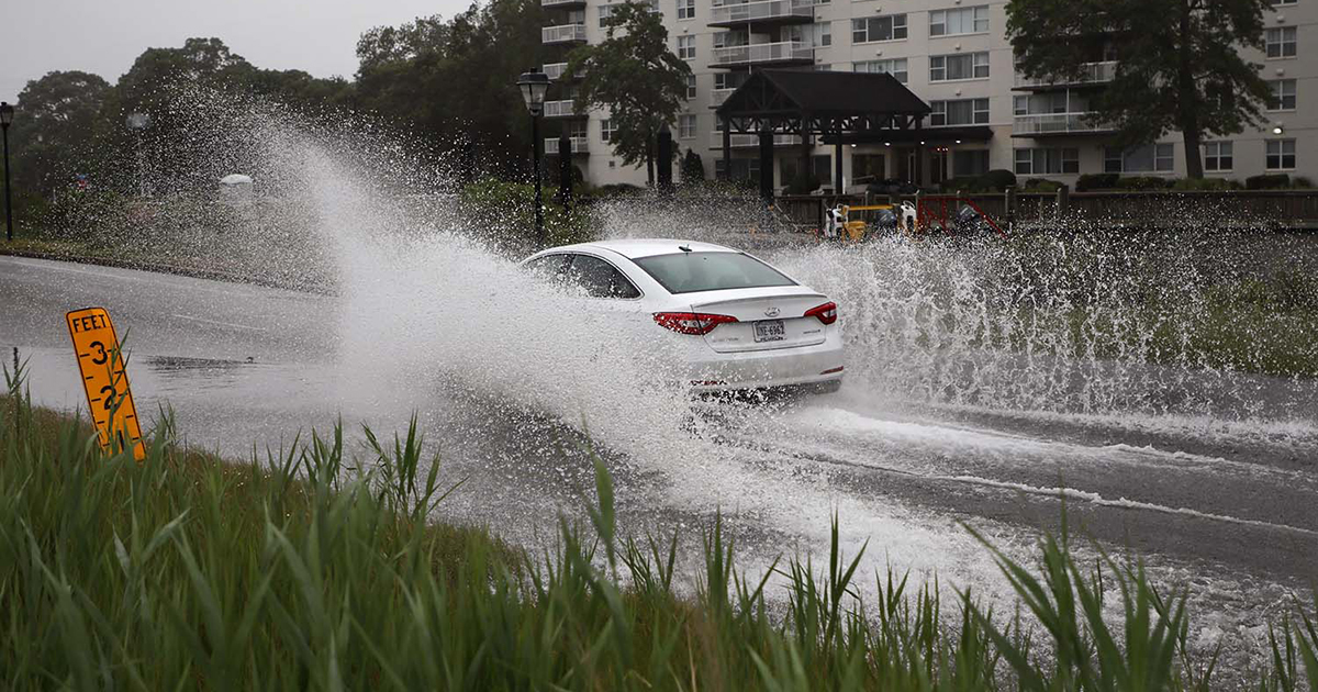 Sunny Day Flooding Increases Fecal Contamination of Coastal Waters