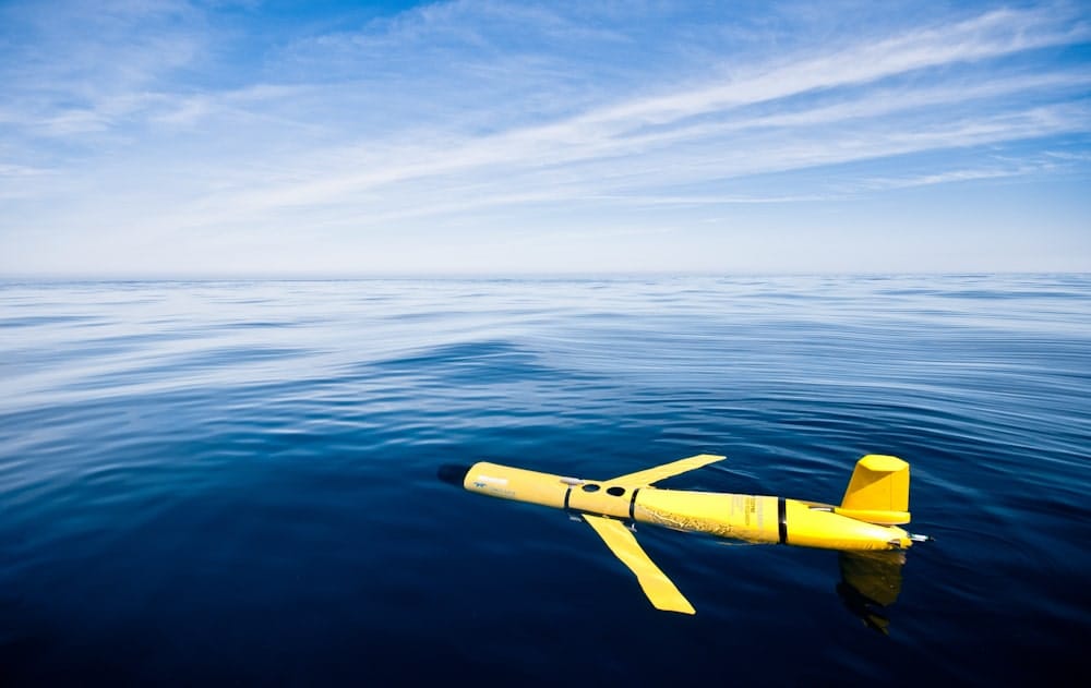 The deep Slocum Glider "WILLY" is seen at the sea surface as it transmits data wirelessly. WILLY is performing a series of tests, diving in steps from the surface all the way down to 600-1000m in order to pressure-test the hull. IMEDEA: Instituto Mediterráneo de Estudios AvanzadosTMOOS: Tecnologías Marinas, Oceanografía Operacional y Sostenibilidad.Location: North Coast of Mallorca, Spain