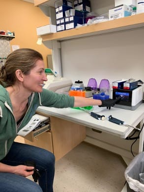 Mackenzie Gavery, Ph.D., at work studying oyster transcriptomics.