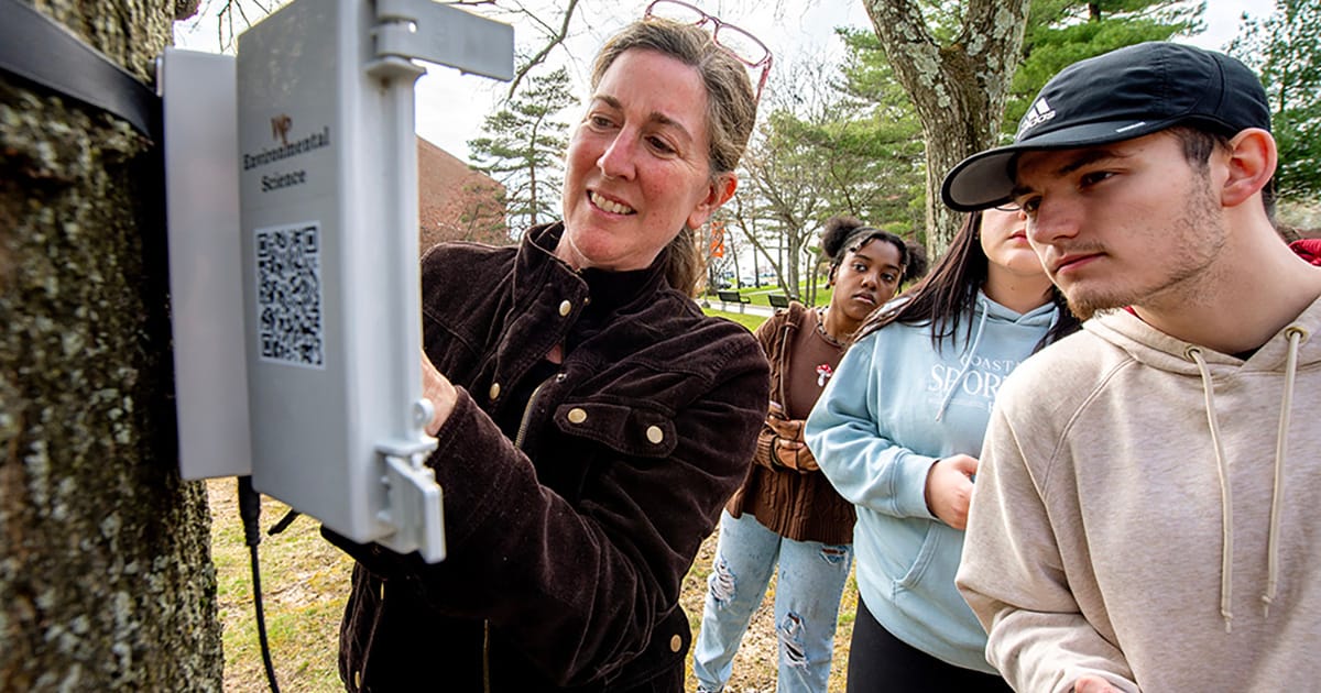 Professor Nicole Davi studies trees on the University campus with her students. (Image credit: William Paterson University)