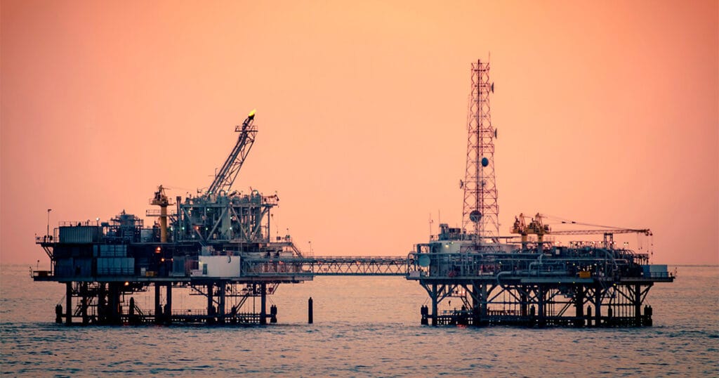 Oil platform silhouette in gulf of america