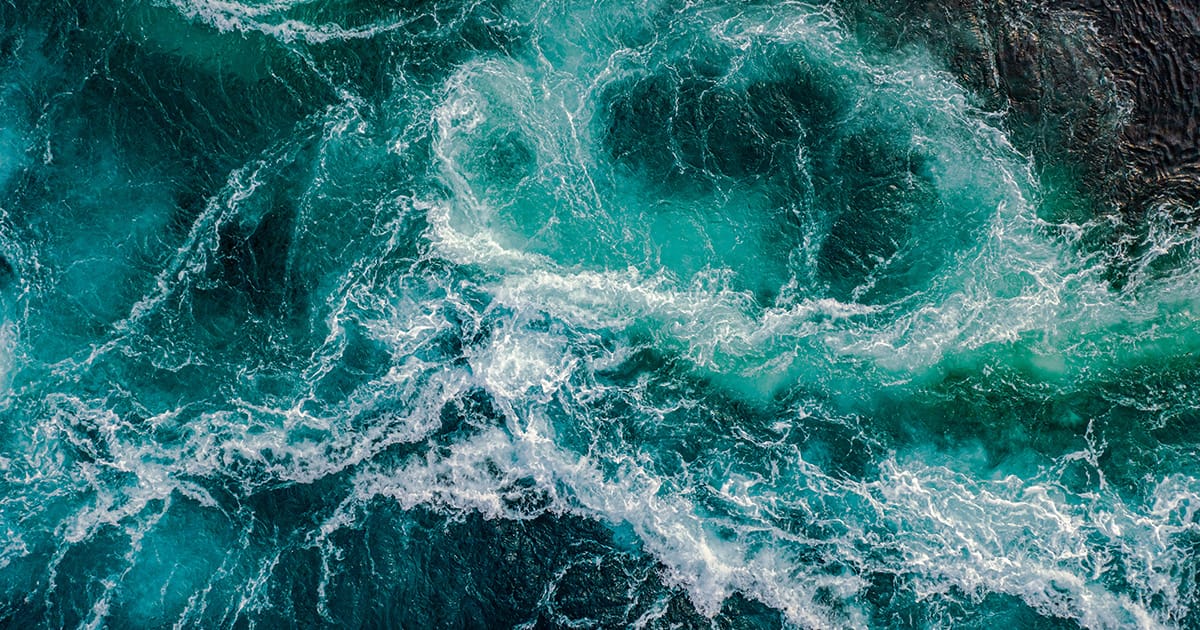 Waves of water of the river and the sea meet each other during high tide and low tide.