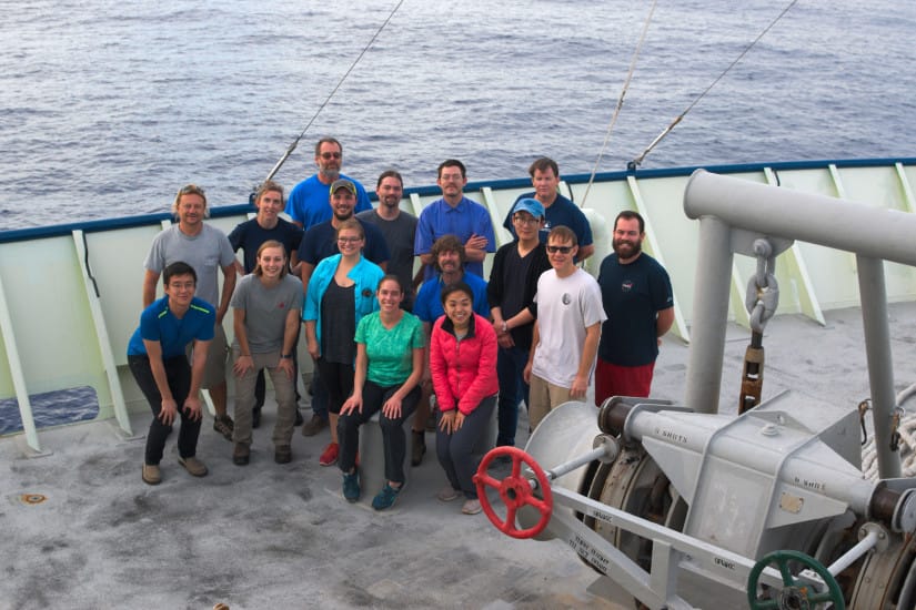 Researchers from several universities took part in fieldwork led by Jinhua Gong (front row, red jacket) and Wenyuan Fan (at right, blue hat) aboard Scripps Oceanography research vessel Roger Revelle. 