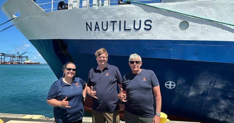 The KONGSBERG team dockside in Honolulu ahead of the NA178 expedition. Left to right: Colleen Peters, Jørn Horvik, and Knut Terje will spend 14 days at sea testing the EM 304 MKII aboard E/V Nautilus. (Image credit: KONGSBERG)
