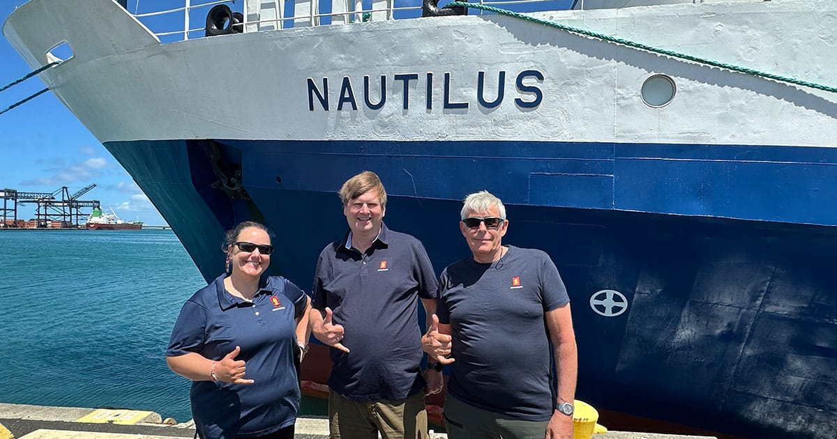 The KONGSBERG team dockside in Honolulu ahead of the NA178 expedition. Left to right: Colleen Peters, Jørn Horvik, and Knut Terje will spend 14 days at sea testing the EM 304 MKII aboard E/V Nautilus. (Image credit: KONGSBERG)