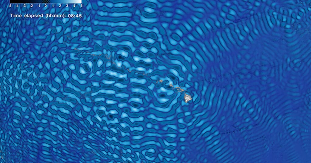 A data visualization showing internal tides data around the Hawaiian Islands from NASA Goddard's Space Flight Center simulation run. Internal tides data appear on the water surface, and the direction of the waves reveals the interplay between the steep underwater features and the tidal energy generated in the region.