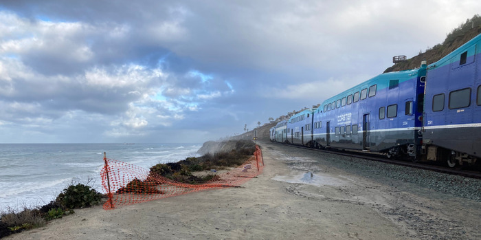 Many of California's eroding coastal bluffs contain critical cliff top infrastructure including highways, railways, power plants, wastewater facilities, military installations, housing, businesses, and more. Photo: Adam Young/Scripps Institution of Oceanography