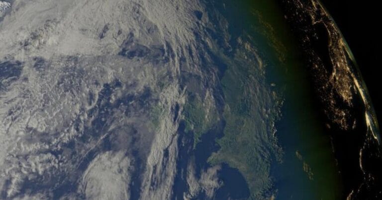 3d composite of Nasa open source images being built on to a wiremesh frame that is a representative form of Earth, with clouds. (Image credit: Victor Murphy)