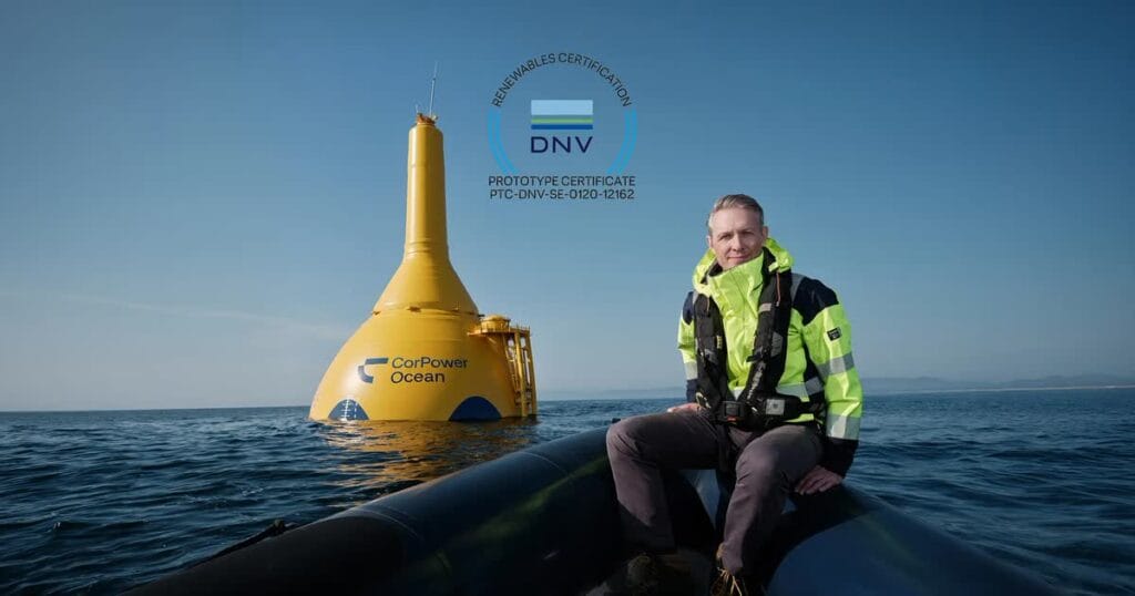 CorPower Ocean CEO Patrik Möller beside the yellow C4 wave energy converter.