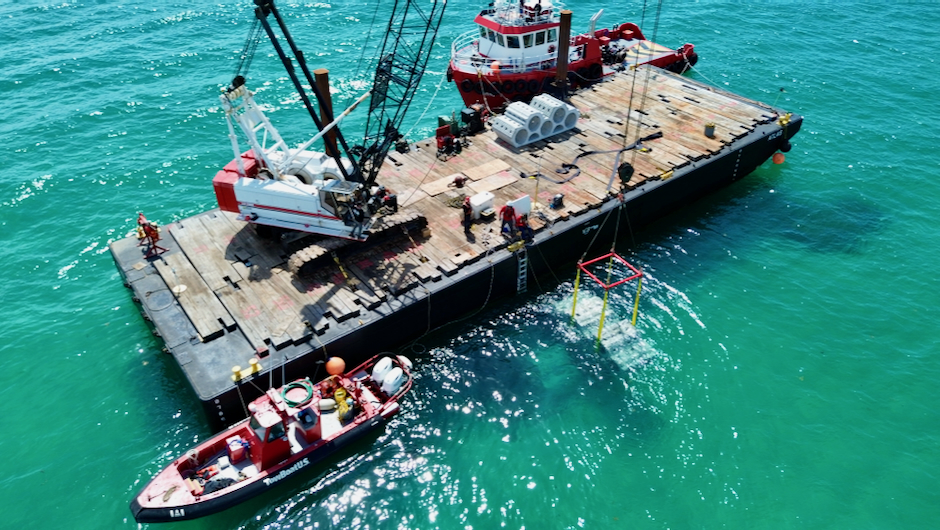 Barge deploys three 3D printed SEAHIVE structures.