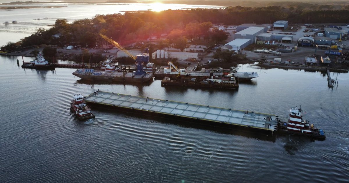 An aerial view of Charleston's waterfront with a floating pier in the foreground. Charleston’s waterfront now has a new, state-of-the-art floating pier. The new pier and facility will provide essential support to NOAA Ship Nancy Foster, NOAA Ship Ronald H. Brown, and NOAA Corps officers and civilian mariners who rely on safe, resilient waterfront infrastructure to execute scientific and operational missions. (Image credit: Alan Blackwell, NOAA)