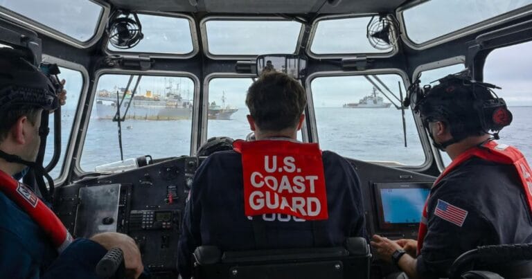 A U.S. Coast Guard long-range interceptor boatcrew from the Legend-class cutter Midgett (WMSL 757) monitors boarding team members conducting a law enforcement boarding of a fishing vessel under Regional Fisheries Management Organizations authority in the Pacific Ocean, July 2, 2026. (Credit: Petty Officer 3rd Class Austin Wiley)