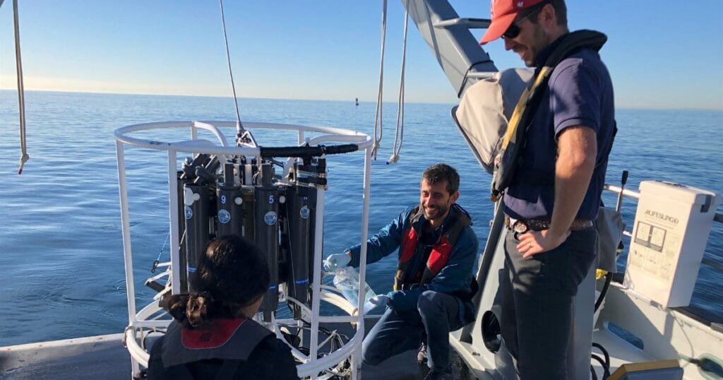 Adam Martiny (standing) and postdoc Pedro Flombaum (in the back) on M/V Nerissa take water samples near California to understand the impact of human-released nutrients on plankton growth. (Image credit: Adam Martiny)