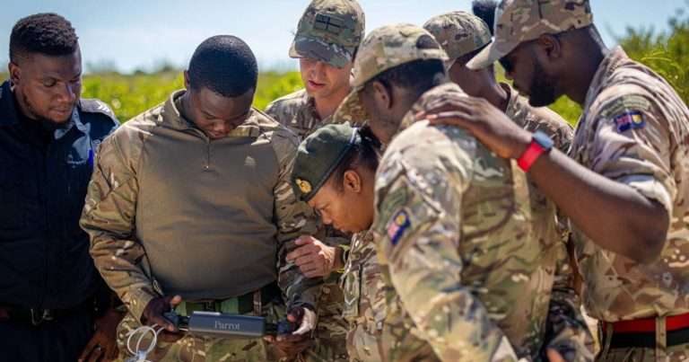 Members of the Turks and Caicos Regiment are shown ways of using drones for disaster relief by 700X Naval Air Squadron