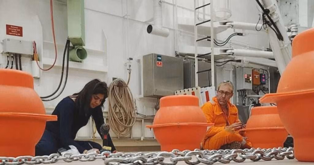 Prof. Andrew Sweetman (SAMS) and Dr. Sheveenah Taukoor (UCT) preparing the mooring system for deployment. (Credit: OceanSOS)