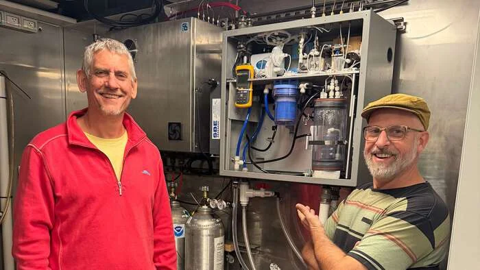 Denis Pierrot, Ph.D. installing the Underway pCO2 system with Martin Veccia, a research technician with the Argentinian National Institute for Fisheries Research and Development(INIDEP). (Image credit: NOAA)