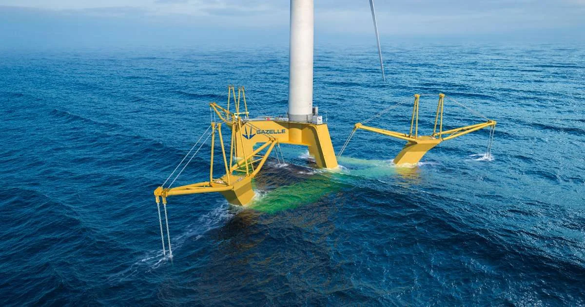 Gazelle Wind Power floating offshore wind platform at sea, yellow articulated frame structure with wind turbine, mild sea conditions. (Image credit: Gazelle Wind Power)