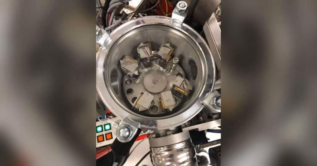The chamber of an ion microprobe, an advanced instrument that occupies an entire room at UCLA. The instrument measures oxygen isotopes in salmon otoliths, or ear bones, inside the chamber to determine temperatures the fish experienced inside their eggs. (Image credit: Rachel Johnson, NOAA Fisheries)