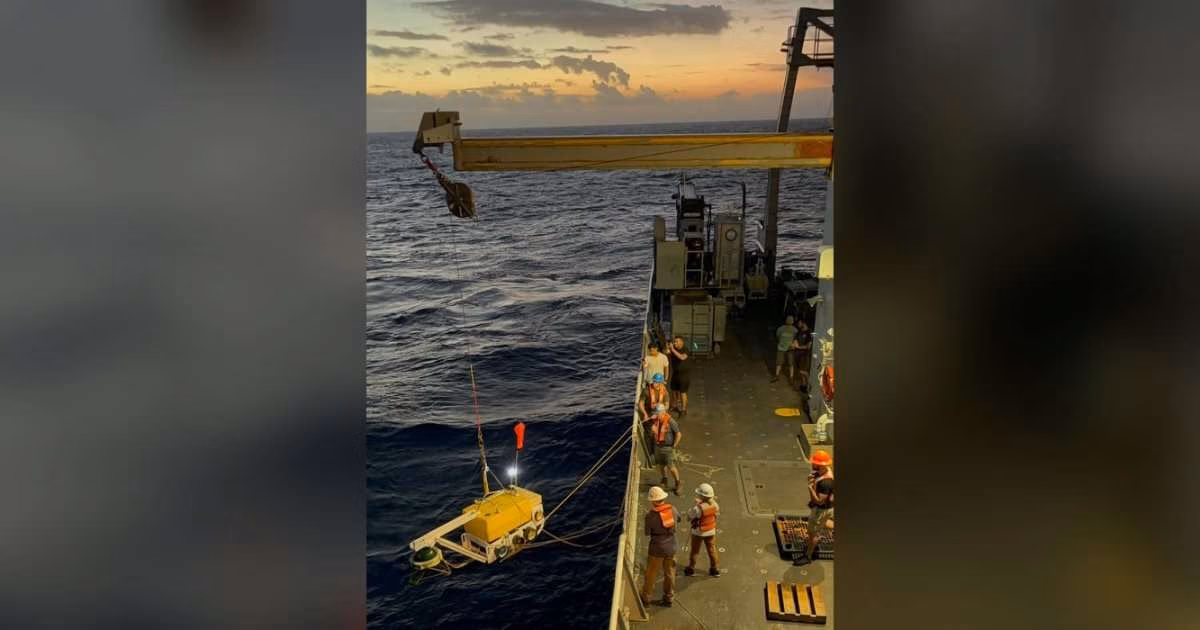 Researchers deploy an ocean bottom seismometer from the US Research Vessel Thomas G. Thompson on a previous mission. (Image credit: Songquia "Shawn" Wei, Michigan State University)
