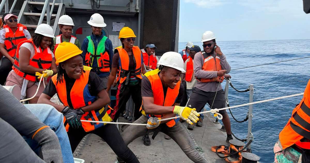 University of Ghana research team recovering a camera-equipped sediment trap array in summer 2026. (Image credit: Colleen Durkin, Monterey Bay Aquarium Research Institute)