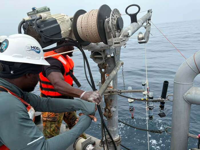 Researchers from the University of Ghana pull samples from the ocean for their geochemical properties to be examined in the lab. (Image credit: Colleen Durkin, Monterey Bay Aquarium Research Institute)