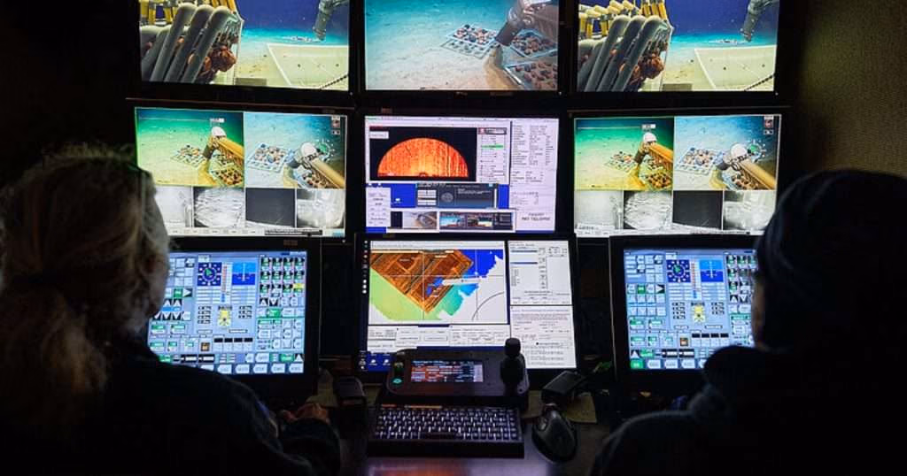 Researchers can monitor what the underwater robot sees on the seabed while on board the vessel. The expedition includes researchers from 17 institutions across seven European countries. Their disciplines range from biology and microbiology to chemistry, oceanography and geology. (Image credit: Tim Kalvelage)