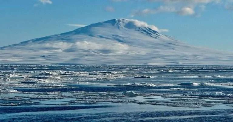 Sea ice and ice floes off Victoria Land, Antarctica, with Mount Melbourne in the background. (Image credit: Alberto C Naveira Grabato)
