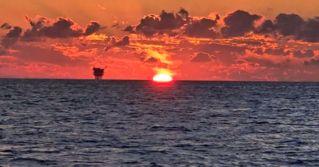 Sunset over the Gulf. A new study by FIU researchers found that populations of deep-water fishes, crustaceans and squid declined significantly following the 2010 Deepwater Horizon oil spill and have yet to recover. (Image credit: Florida International University)