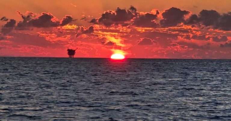 Sunset over the Gulf. A new study by FIU researchers found that populations of deep-water fishes, crustaceans and squid declined significantly following the 2010 Deepwater Horizon oil spill and have yet to recover. (Image credit: Florida International University)