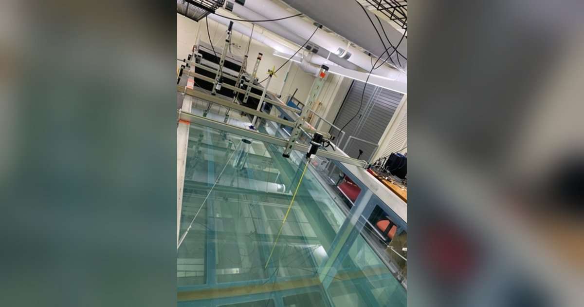 A wave flume with a wind turbine spar in the UMass Amherst Ocean Resources and Renewable Energy Group lab. Top: Aerial view of the Bartholomew Gosnold Monument on Cuttyhunk Island (Credit: Creative Commons/John Phelan).